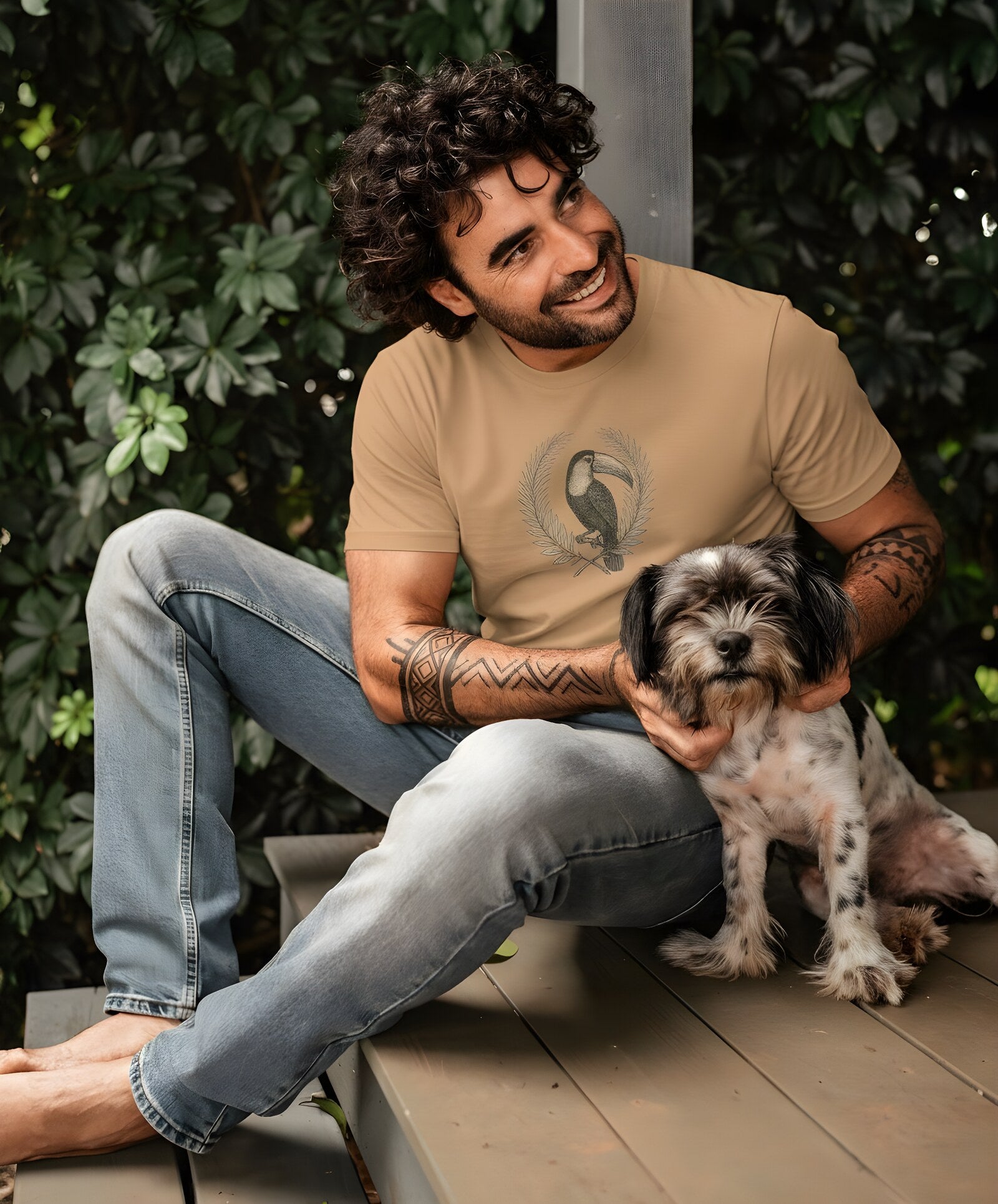 Renan wearing the Tucano toucan tee in sandstone