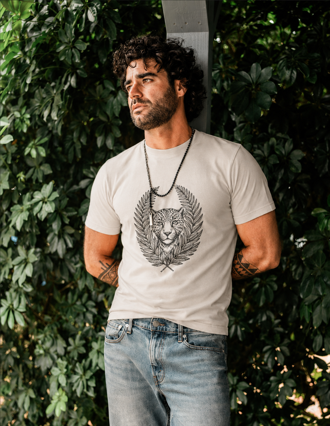 Son of Nature jaguar crest, charcoal on a natural garment-dyed tee